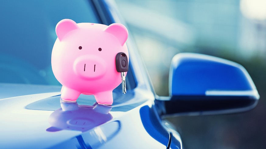 new car with piggy bank, key on hood