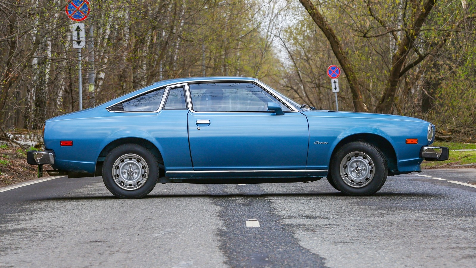 Mazda RX-5 голубая сбоку