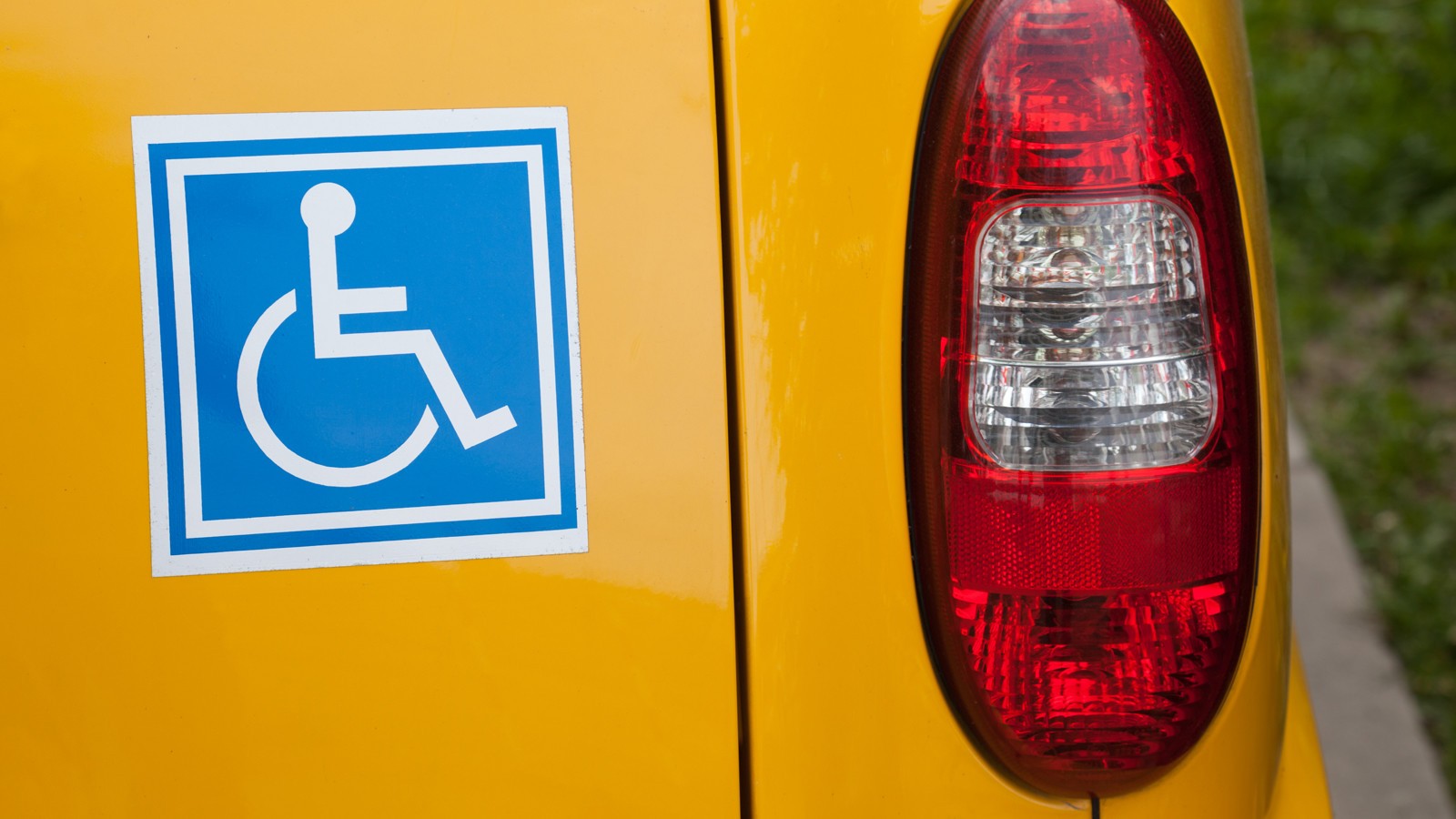 Handicapped sign on back of car