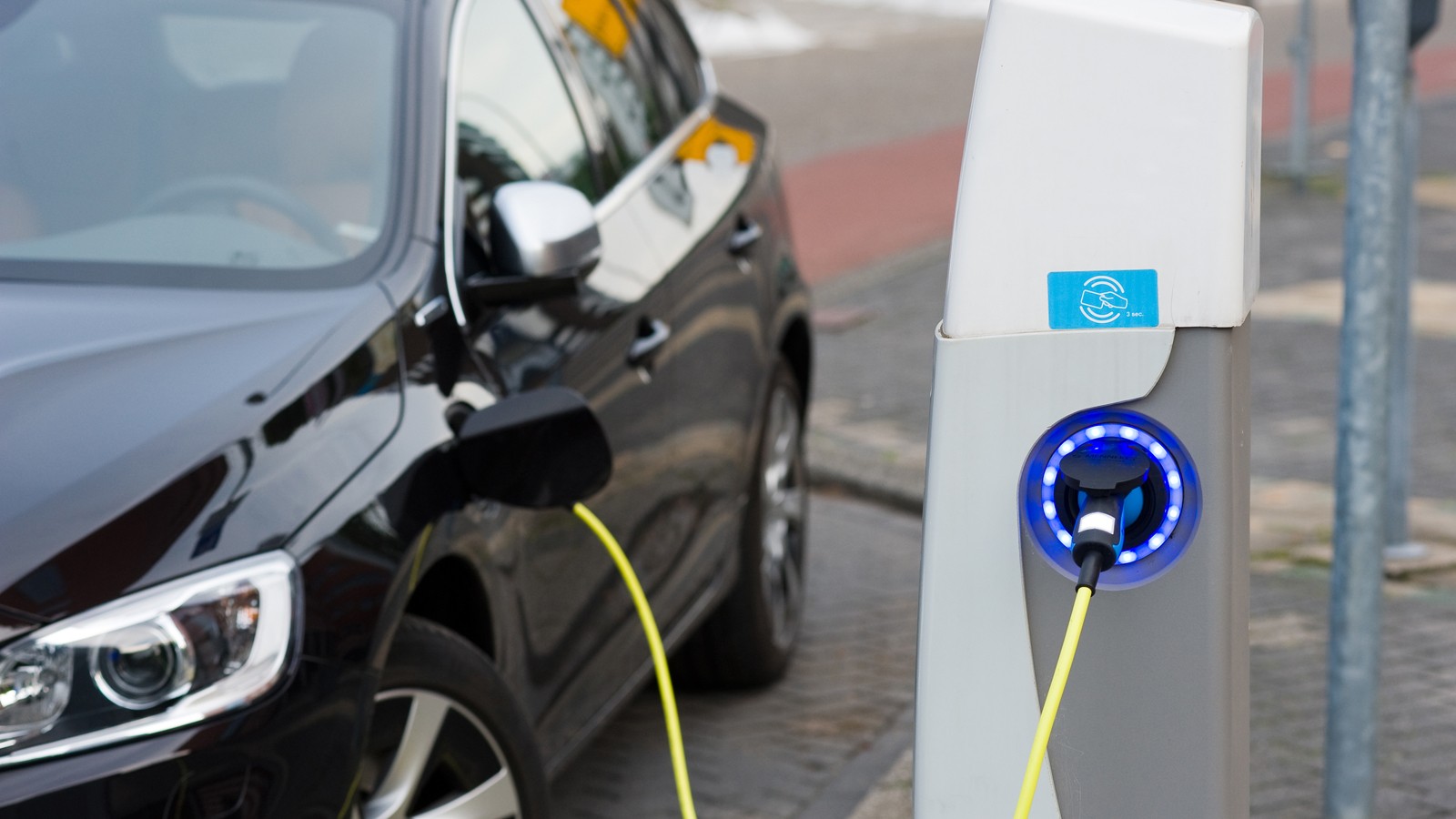 Electric car at charging station