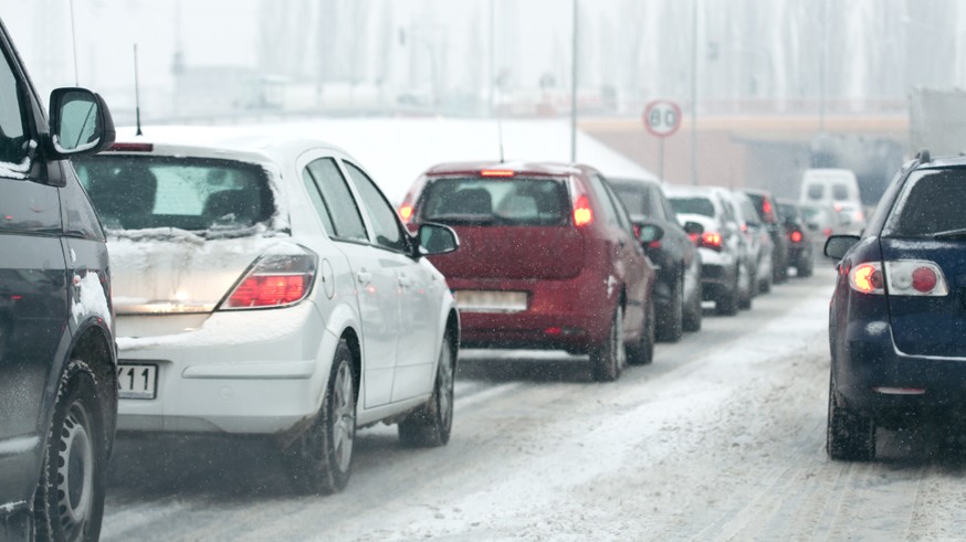traffic jam in the city at winter time