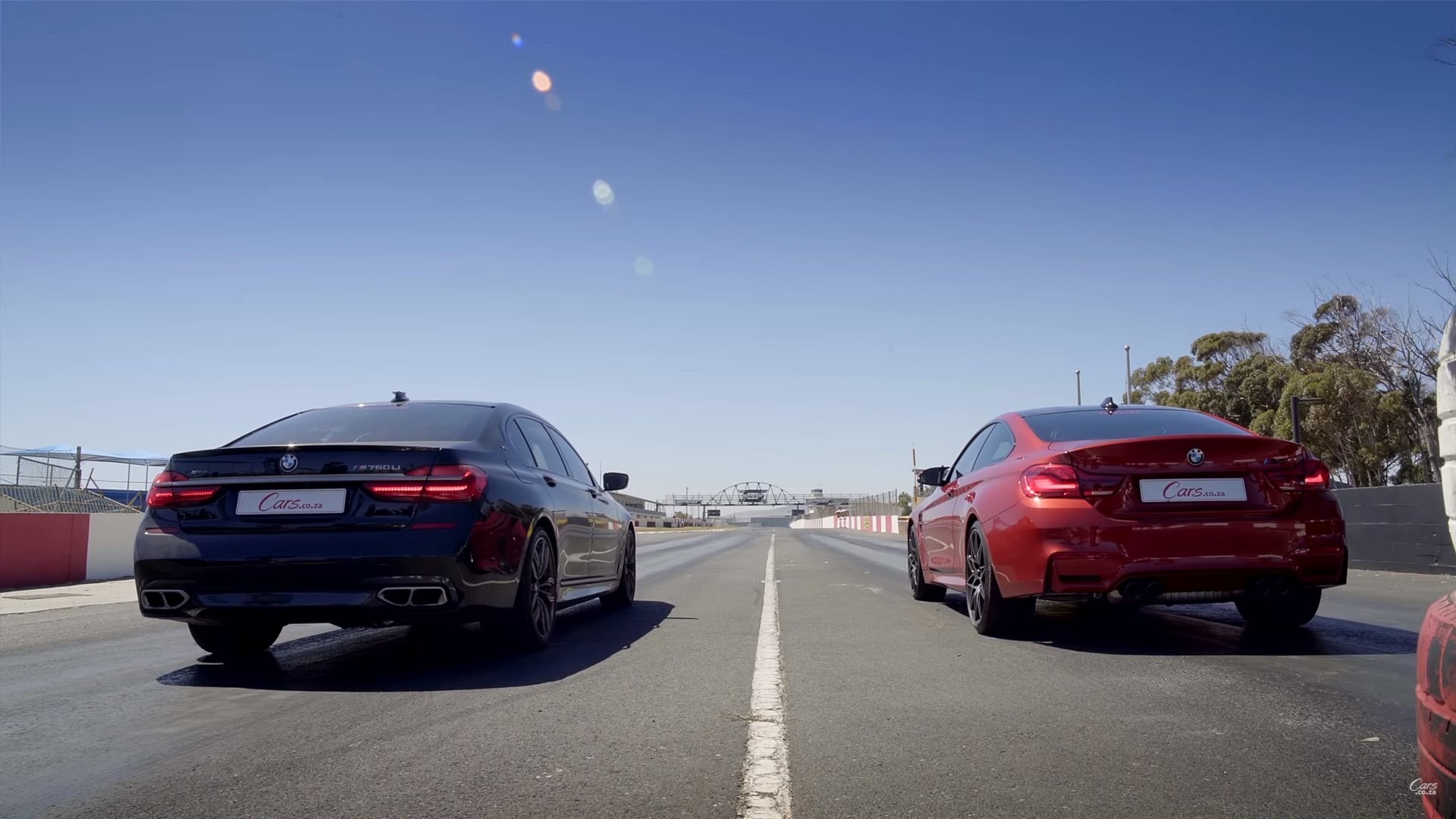 bmw-m760li-vs-bmw-m4-competition-3