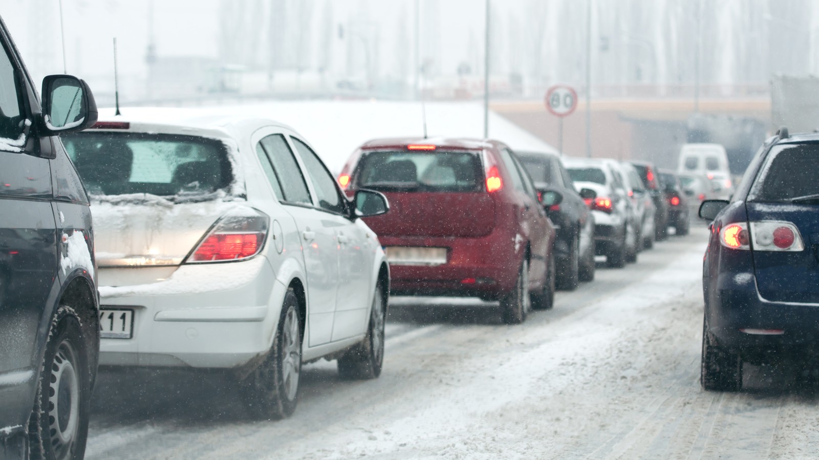 traffic jam in the city at winter time