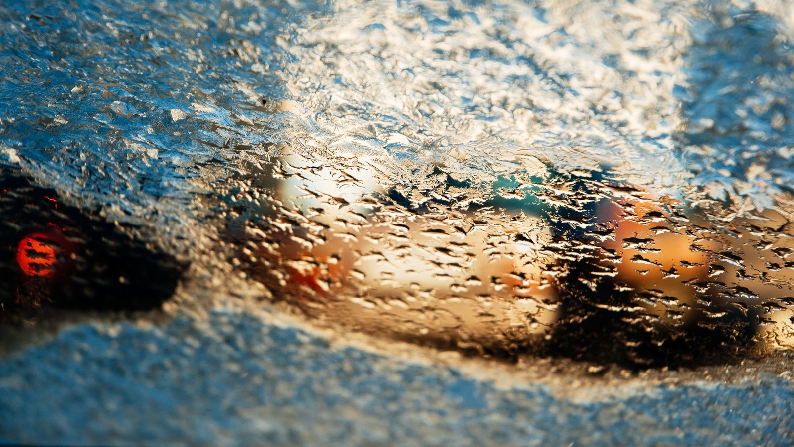 Melting frozen windshield