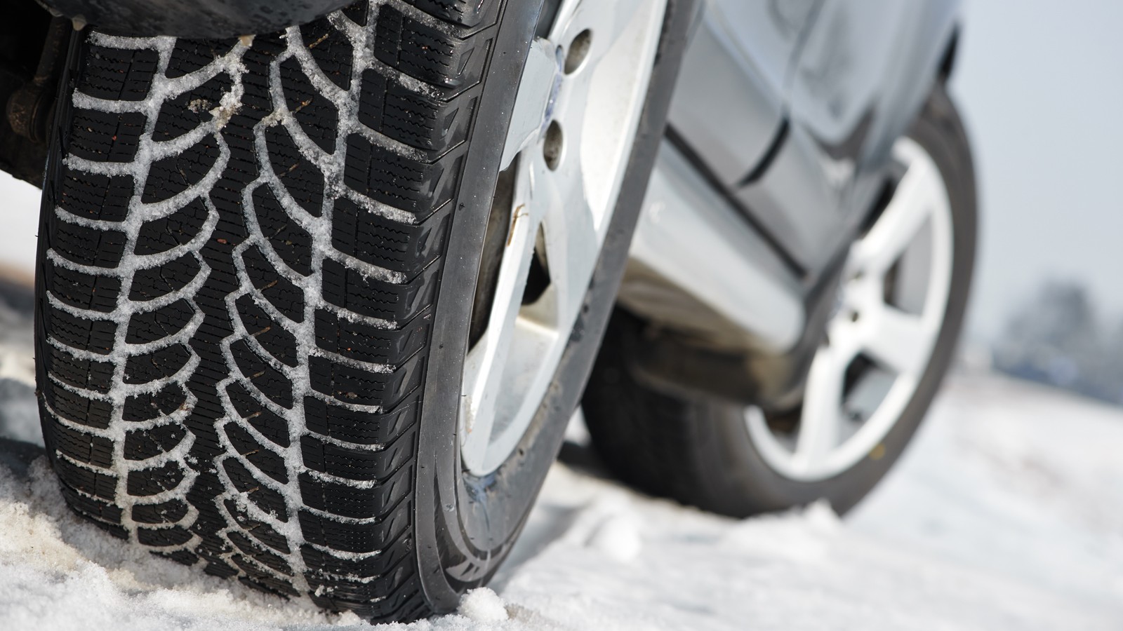 Winter tyres wheels installed on suv car outdoors