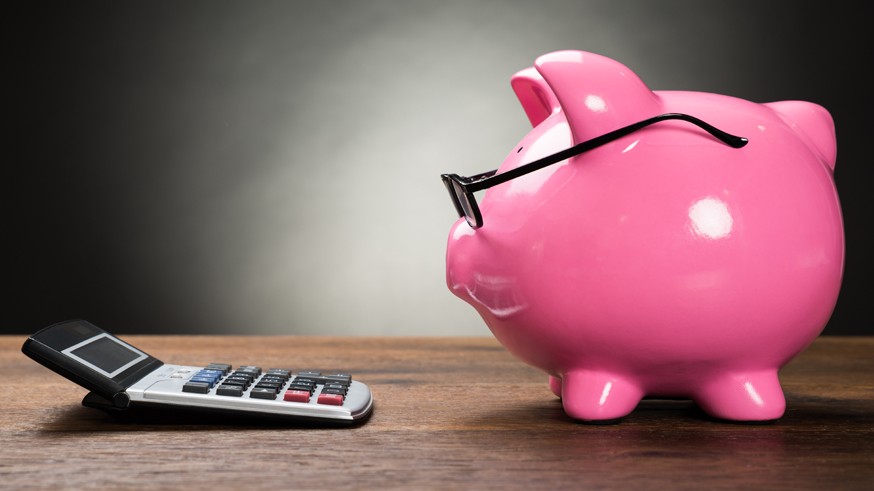 Pink Piggybank And Calculator