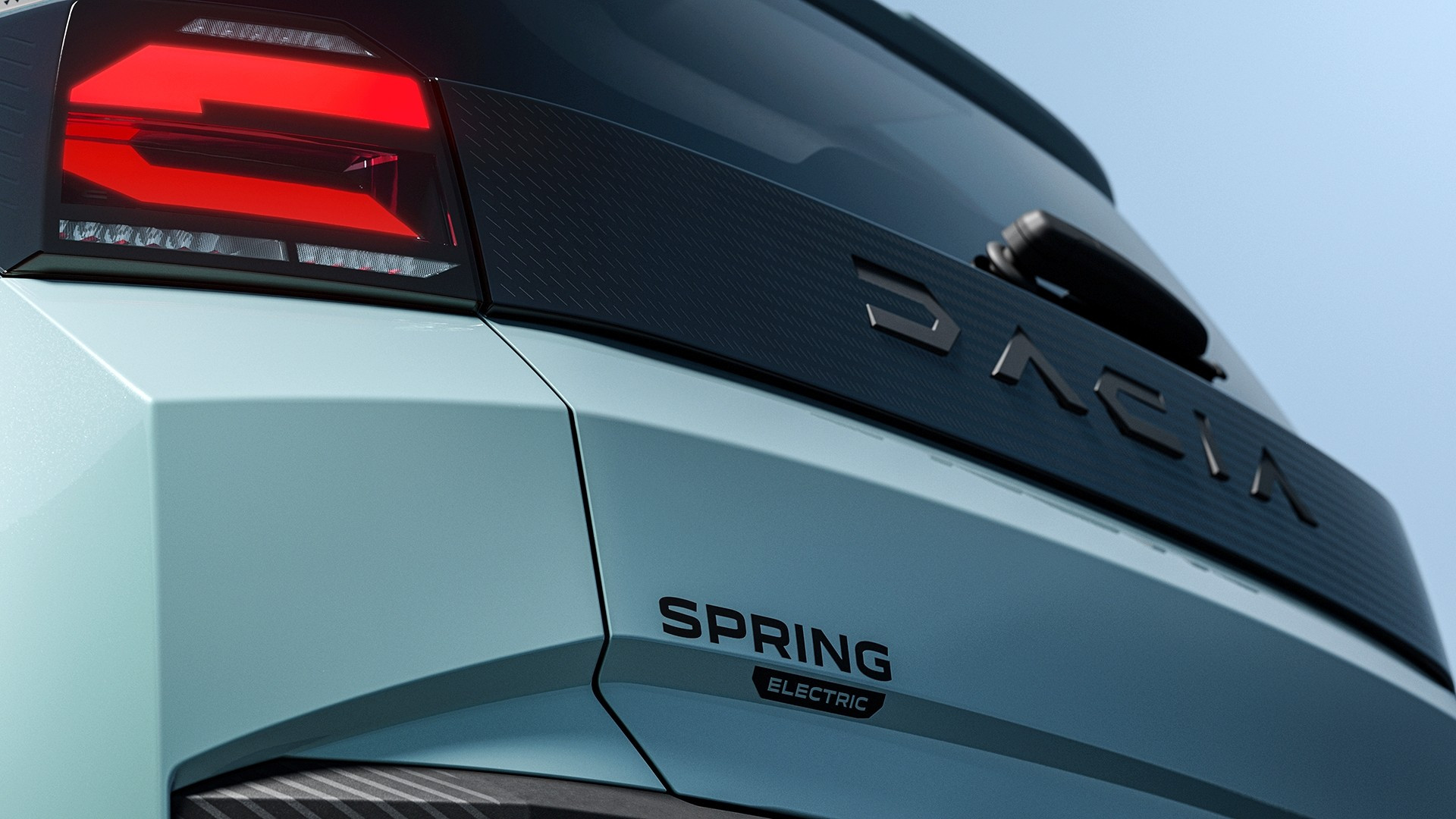 Dacia New Spring показался на первых тизерах: угловатый кузов и техника от Renault Twingo