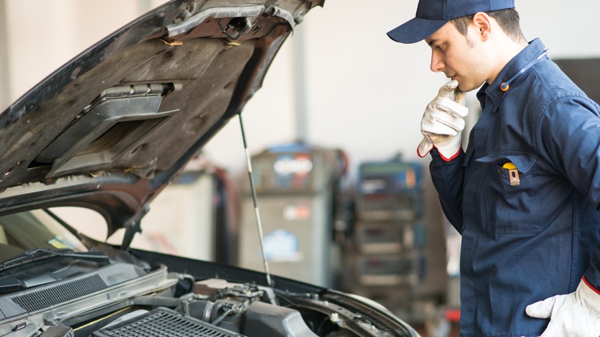 Mechanic at work in his garage