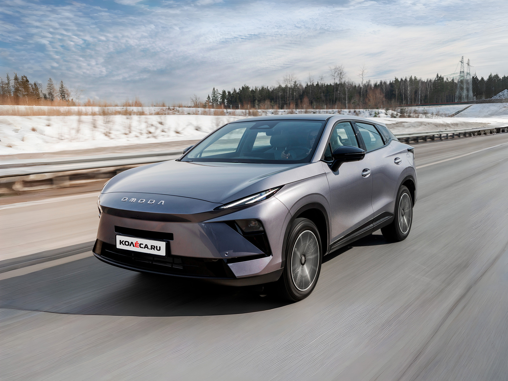 Внешность в стиле «электричек» и новый салон: тест-драйв новой Omoda C5