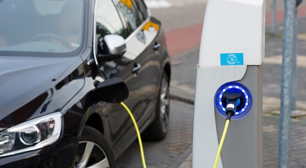 Electric car at charging station