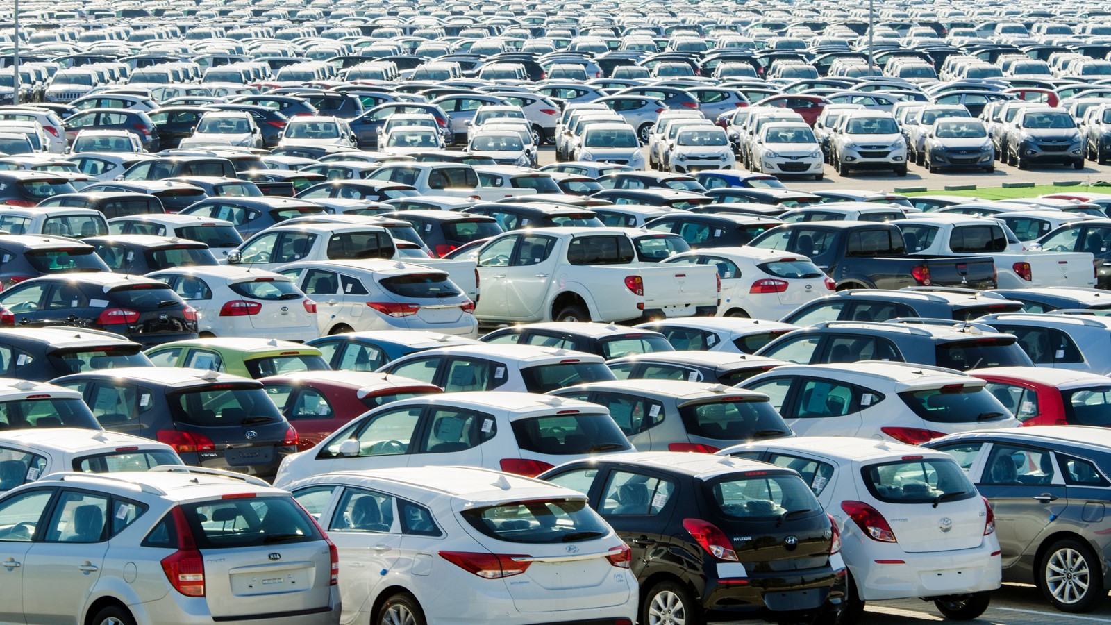 TUSCANY, ITALY — 27 June: New cars parked at distribution center