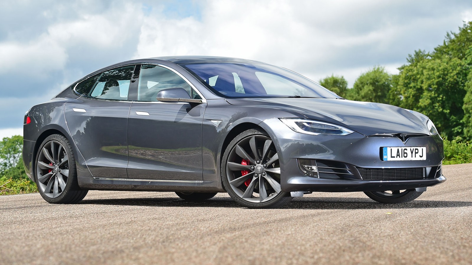 Tesla отзывает около 53 000 автомобилей из-за неисправности ручного ...