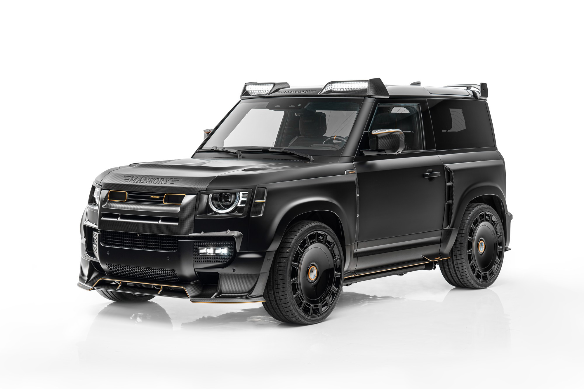 Mansory Defender Black Edition: располневший от карбона кузов и  форсированный V8 - КОЛЕСА.ру – автомобильный журнал