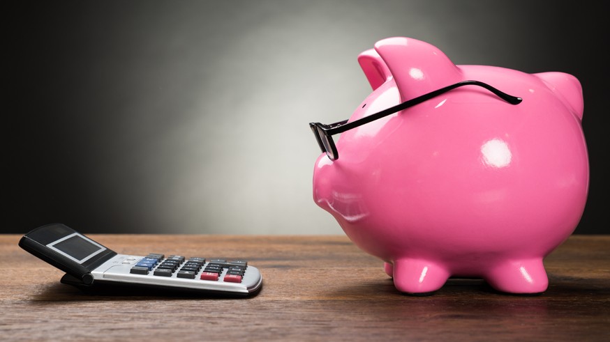 Pink Piggybank And Calculator
