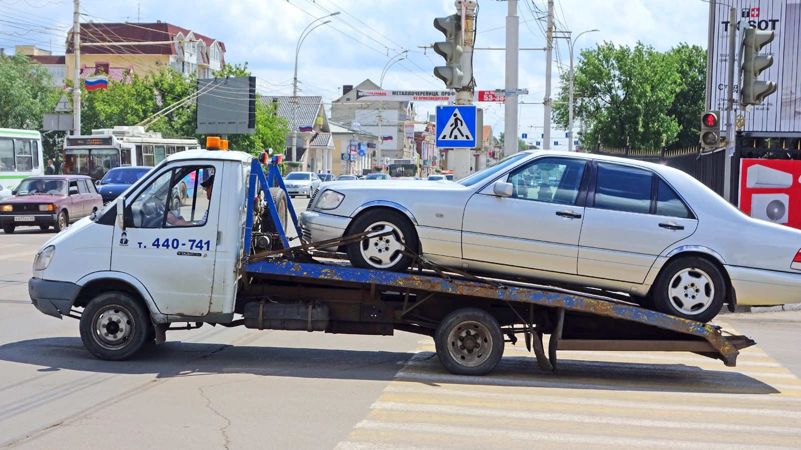 Tow truck with a car