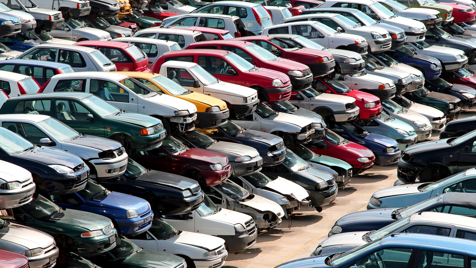 cars destroyed in the courtyard of the automobile junkyard