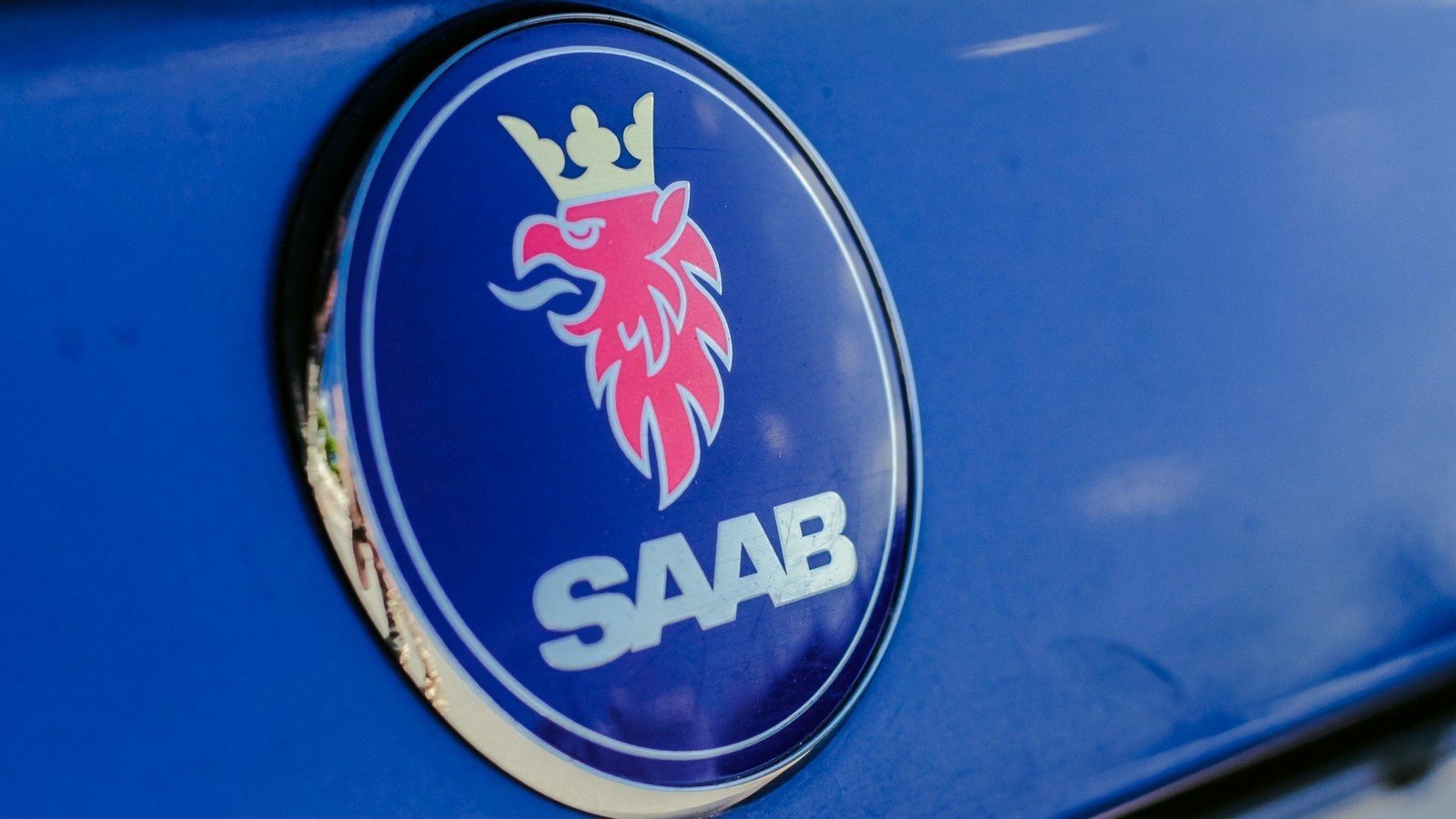 Saab машина значок