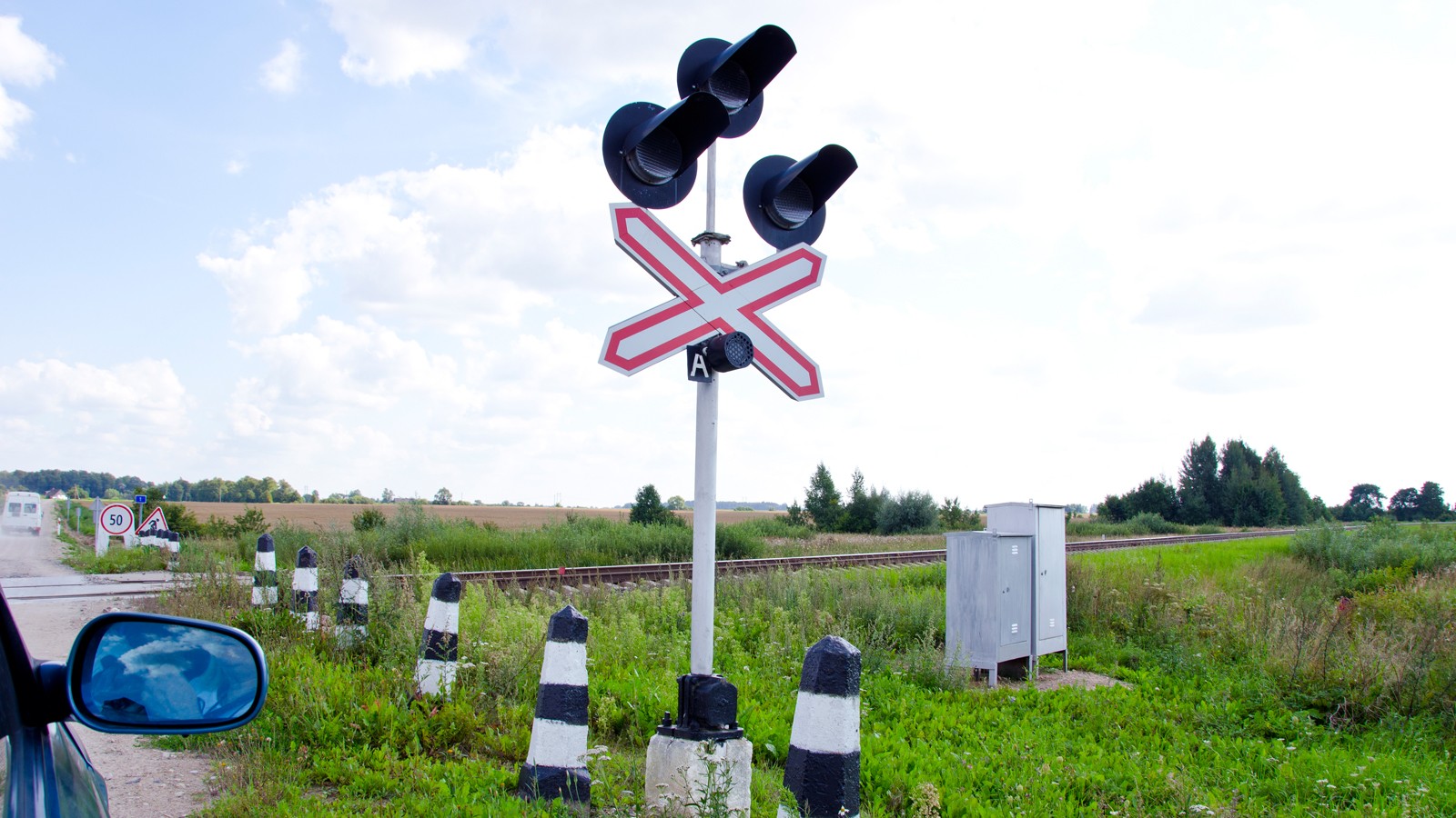 Car stand railway crossing road traffic-light