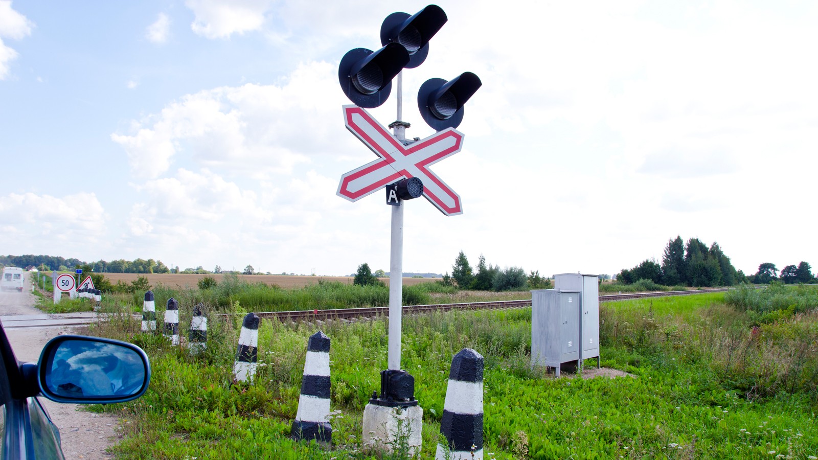Car stand railway crossing road traffic-light
