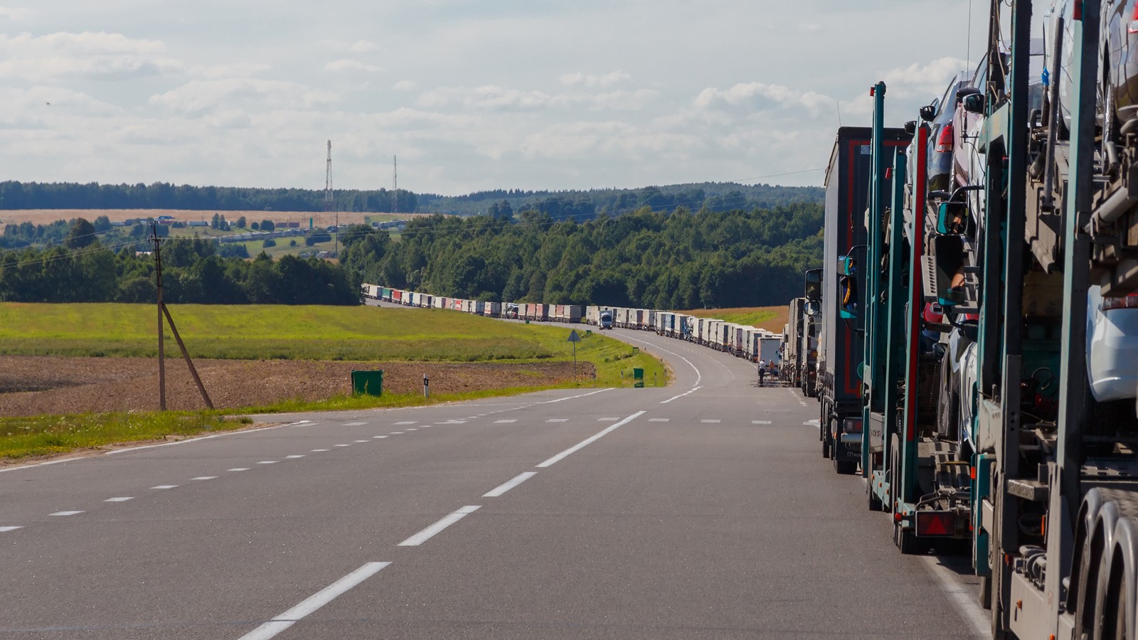 Automotive queue on the road.