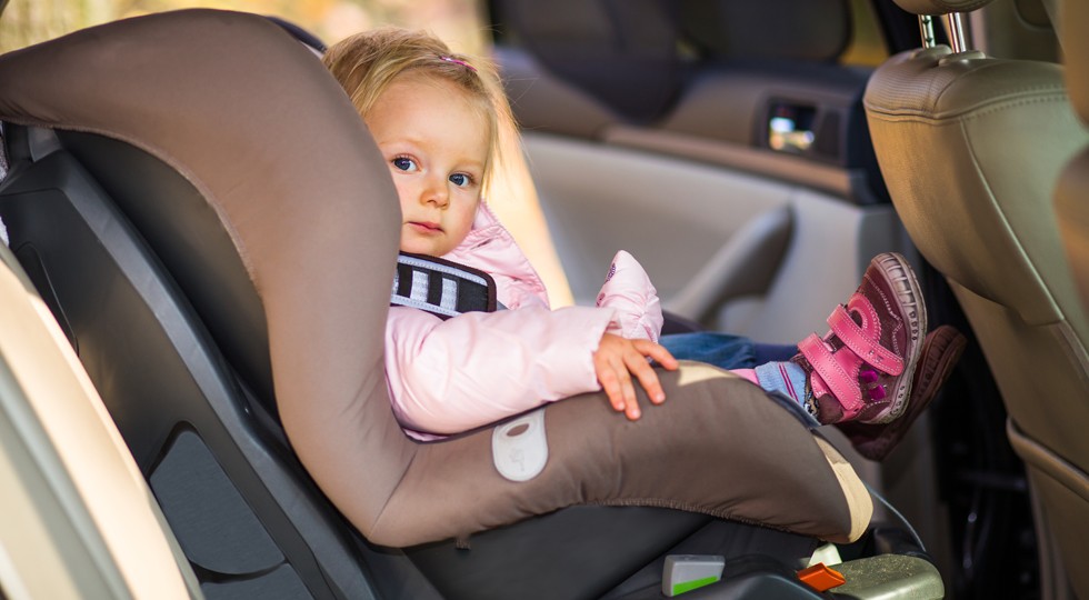 Infant baby girl in car seat