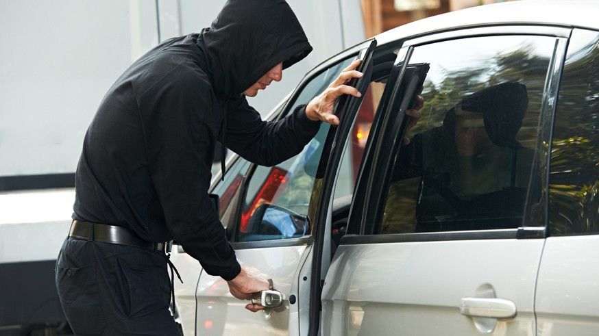 thief burglar at automobile car stealing
