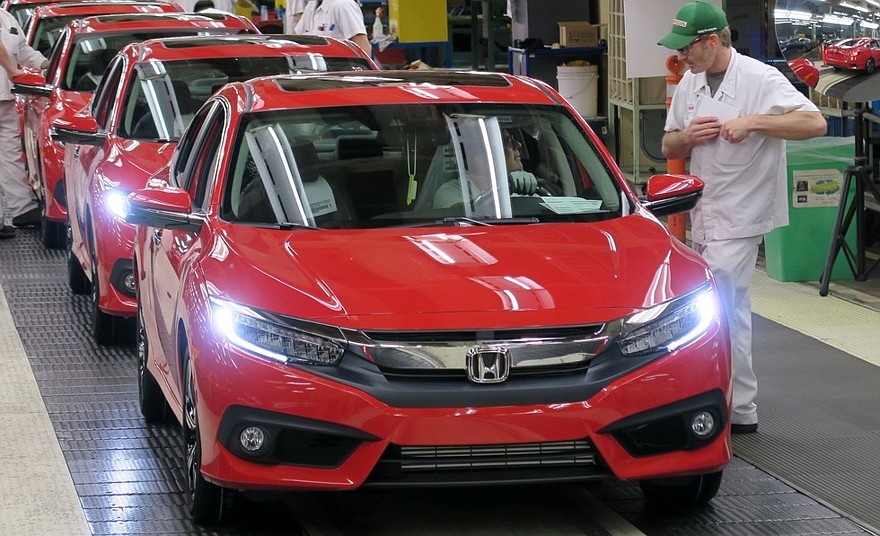 Honda of Canada Mfg. associates perform final inspections on an