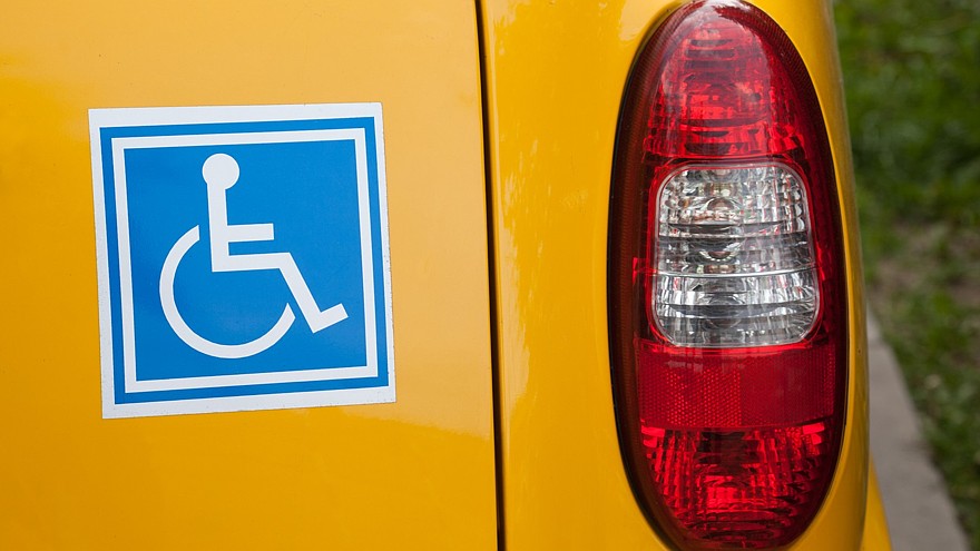 Handicapped sign on back of car