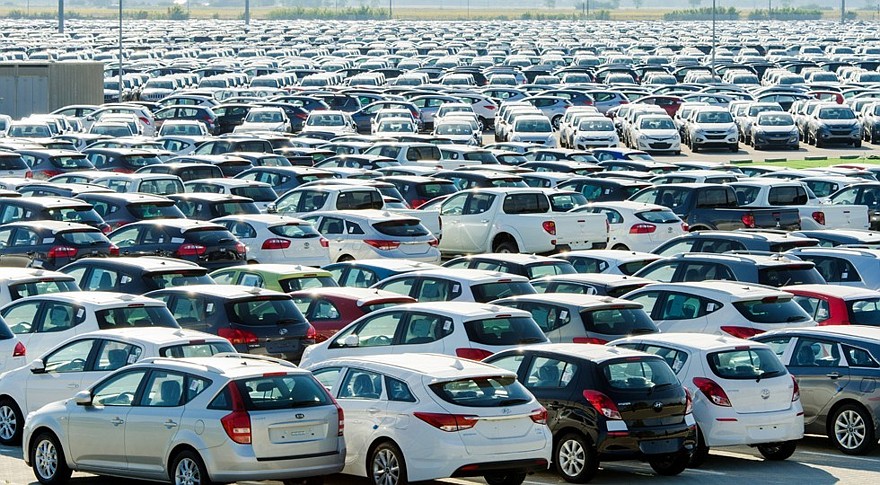 TUSCANY, ITALY — 27 June: New cars parked at distribution center