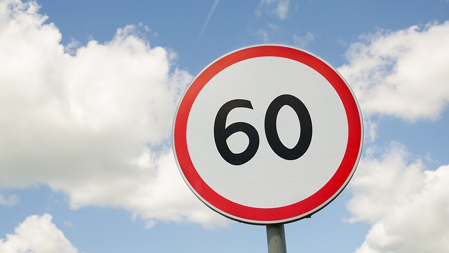 road traffic round sign limiting speed on blue sky