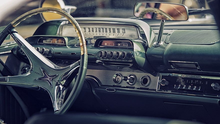 Sleza, Poland, August 15, 2015: Close up on old vintage car steering wheel and cockpit on Motorclassic show on August 15, 2015 in the Poland