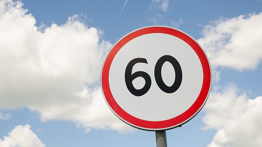 road traffic round sign limiting speed on blue sky