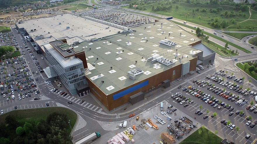Huge shopping mall of household goods with a lot of parking space, aerial view