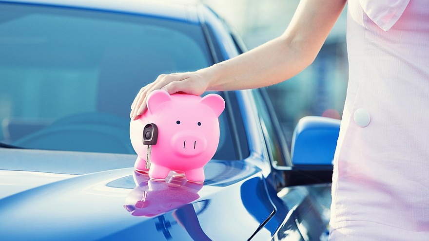 woman customer, agent and new car, pink piggy bank key on hood