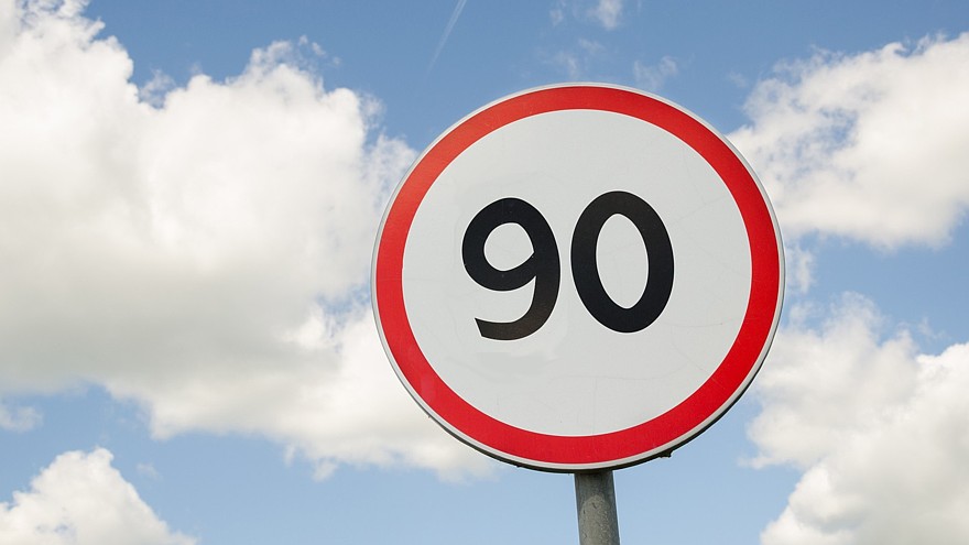 road traffic round sign limiting speed on blue sky