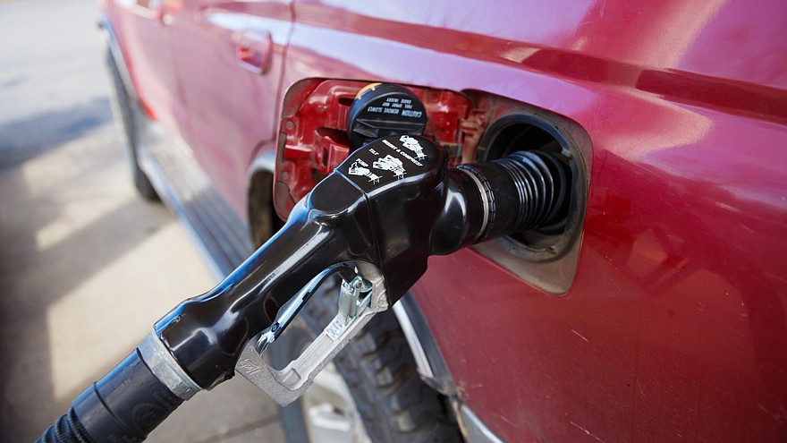 Gas Pump Filling Automobile