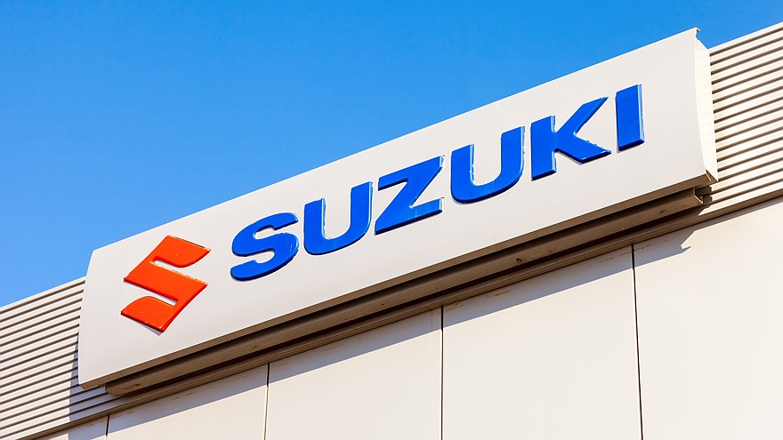 SAMARA, RUSSIA — AUGUST 30, 2014: Suzuki dealership sign against blue sky. Suzuki Motor Corporation is a Japanese multinational corporation