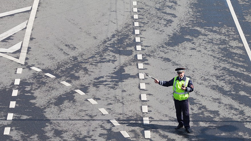 Police officer regulating traffic, Moscow