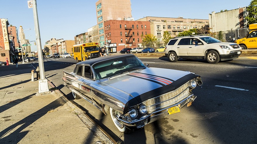 old chrome cadillac car parks on the street in New York